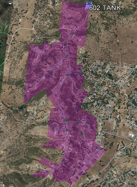 Aerial map overlay with marked areas/zones, possibly indicating regions for specific purposes or planning, and labeled points of interest.