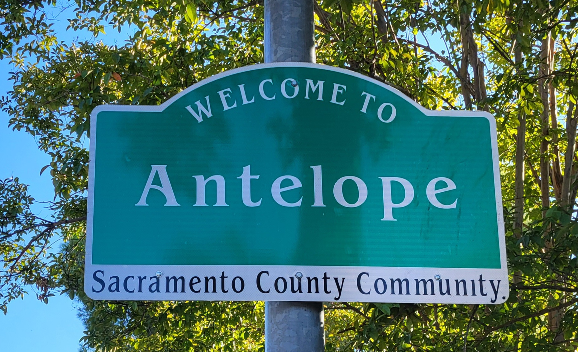 Welcome to Antelope: May contain: sign, symbol, and road sign
