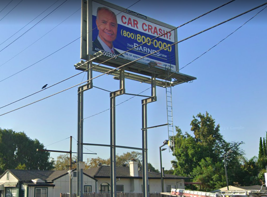 May contain: advertisement, billboard, person, face, and head