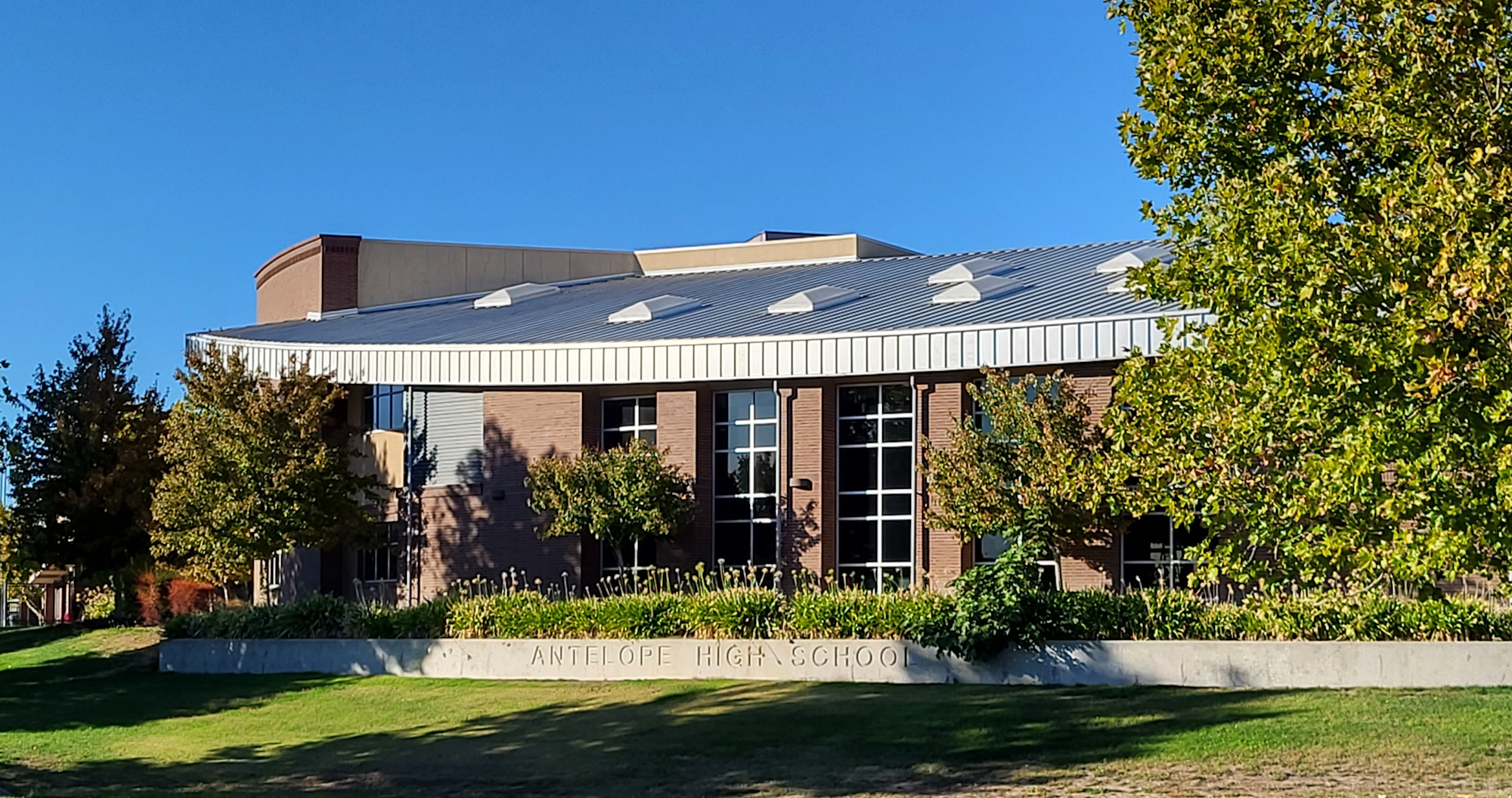 Antelope High School: May contain: grass, plant, architecture, building, lawn, housing, and tree