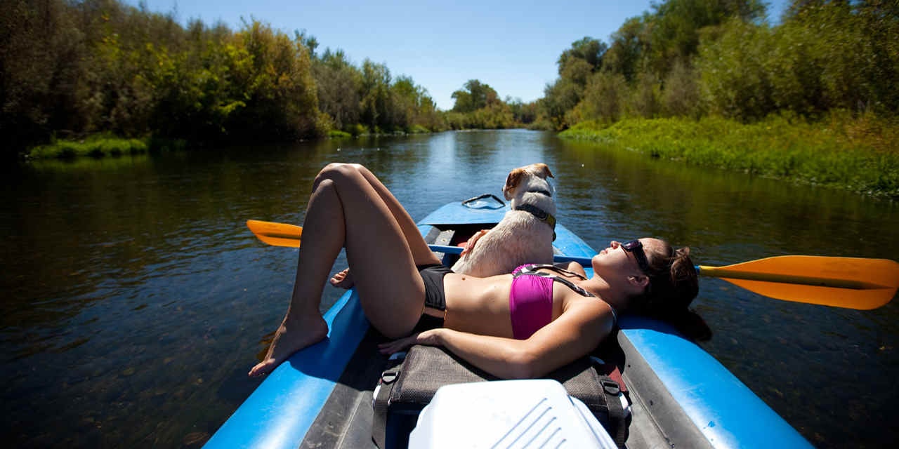 May contain: oars, clothing, shorts, water, and person