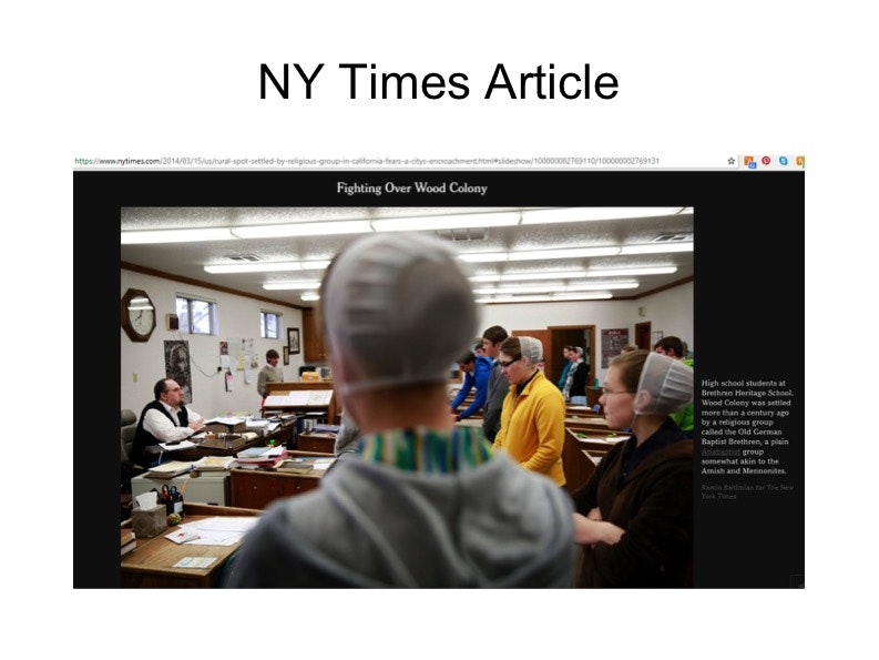 May contain: architecture, building, hospital, people, person, indoors, baseball cap, cap, clothing, hat, school, classroom, room, accessories, and glasses