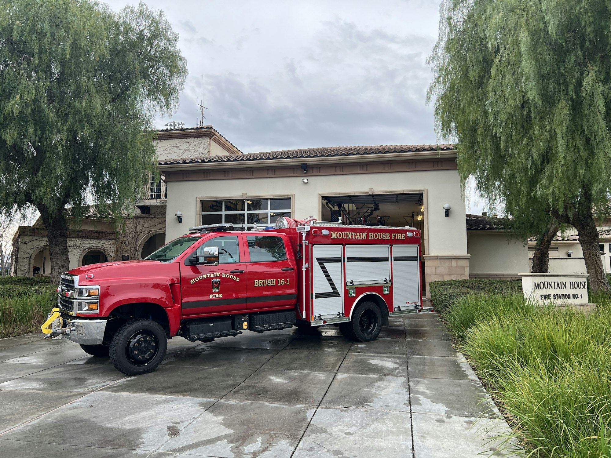 May contain: transportation, truck, vehicle, lamp, fire truck, and fire station