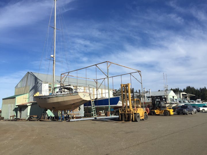 May contain: water, waterfront, port, harbor, pier, boat, transportation, vehicle, pickup truck, truck, and watercraft