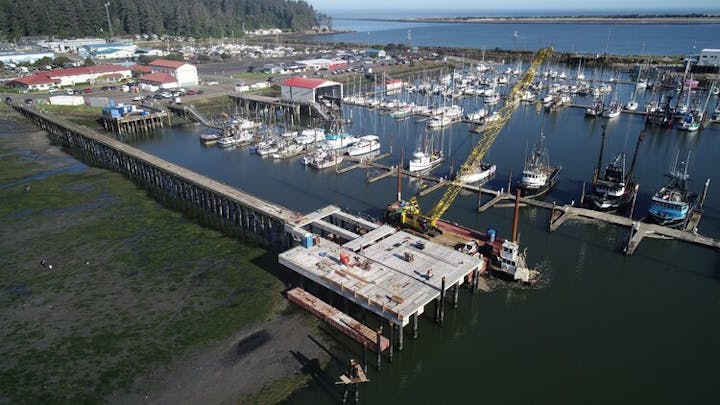 May contain: water, waterfront, harbor, pier, port, marina, and bridge
