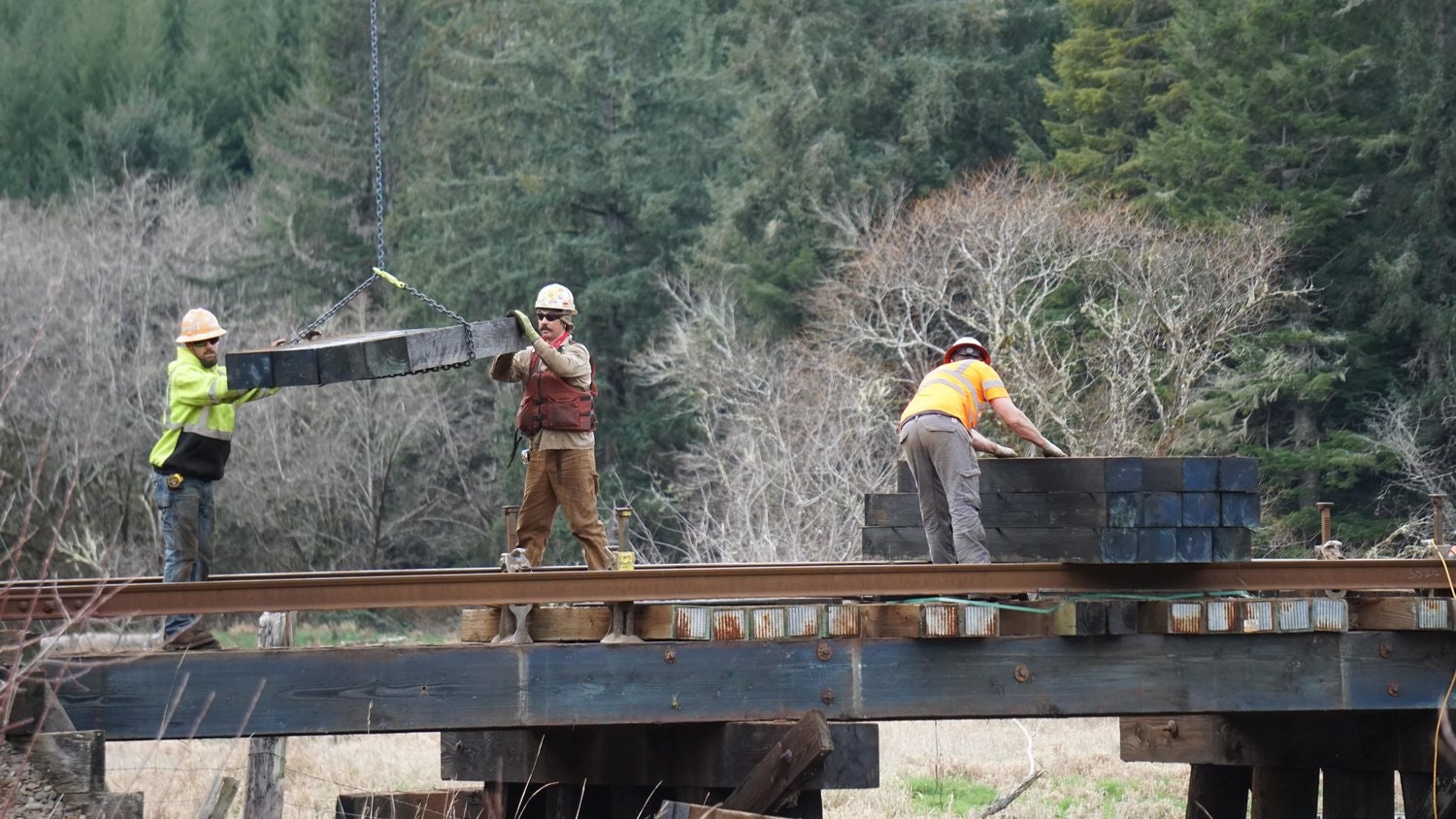 May contain: person, worker, clothing, hardhat, helmet, adult, male, and man