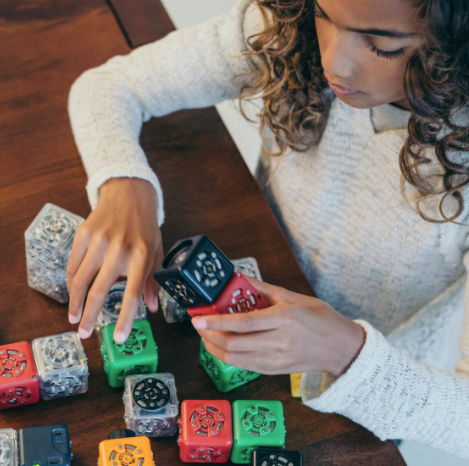 Girl playing with cubes