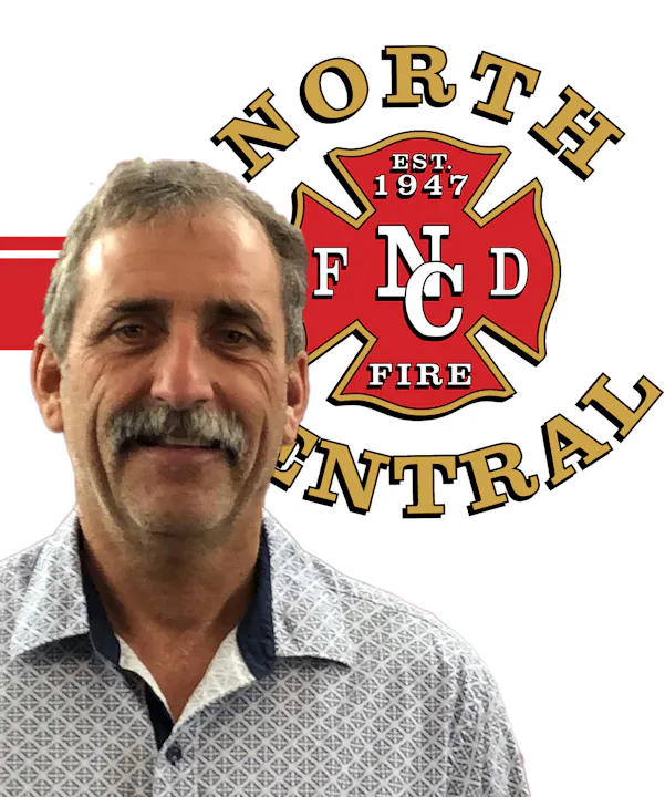 The image features a man smiling alongside the logo of North Central Fire, established in 1947.