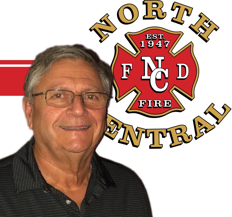 The image features a man smiling next to a logo for "North Central Fire Department," established in 1947.