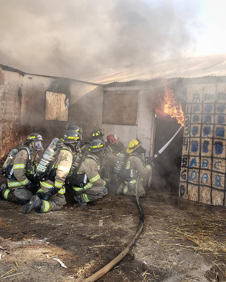 May contain: person, human, helmet, clothing, apparel, and fireman