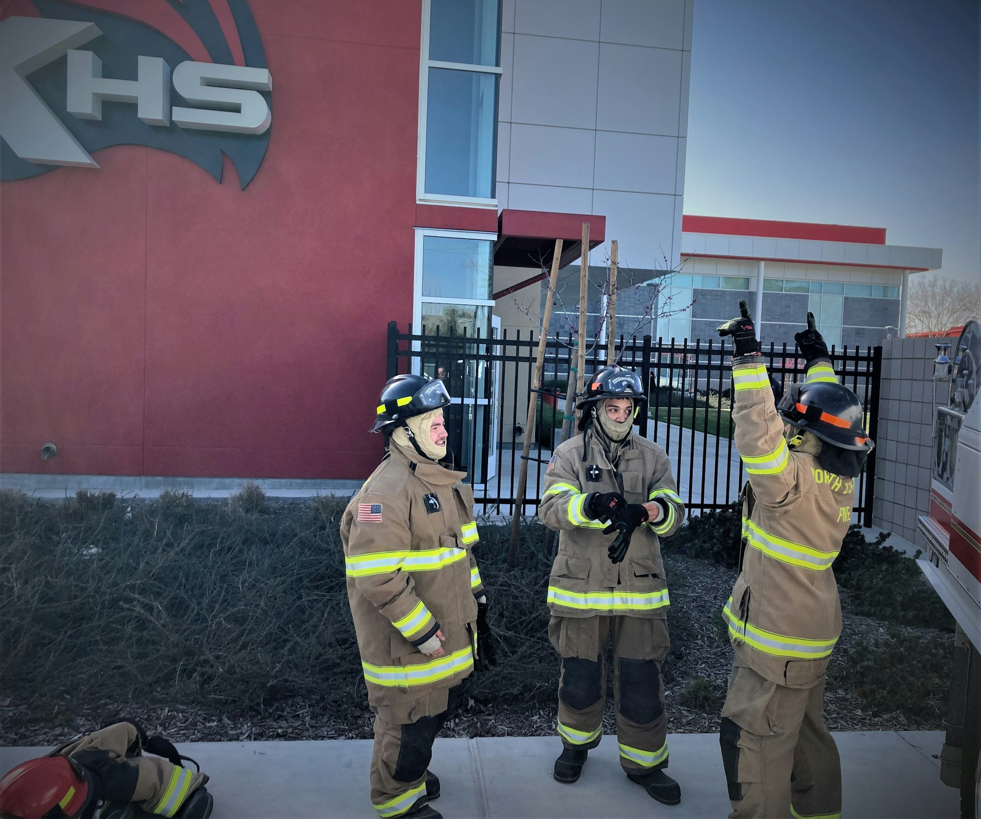 May contain: person, human, fireman, helmet, clothing, and apparel