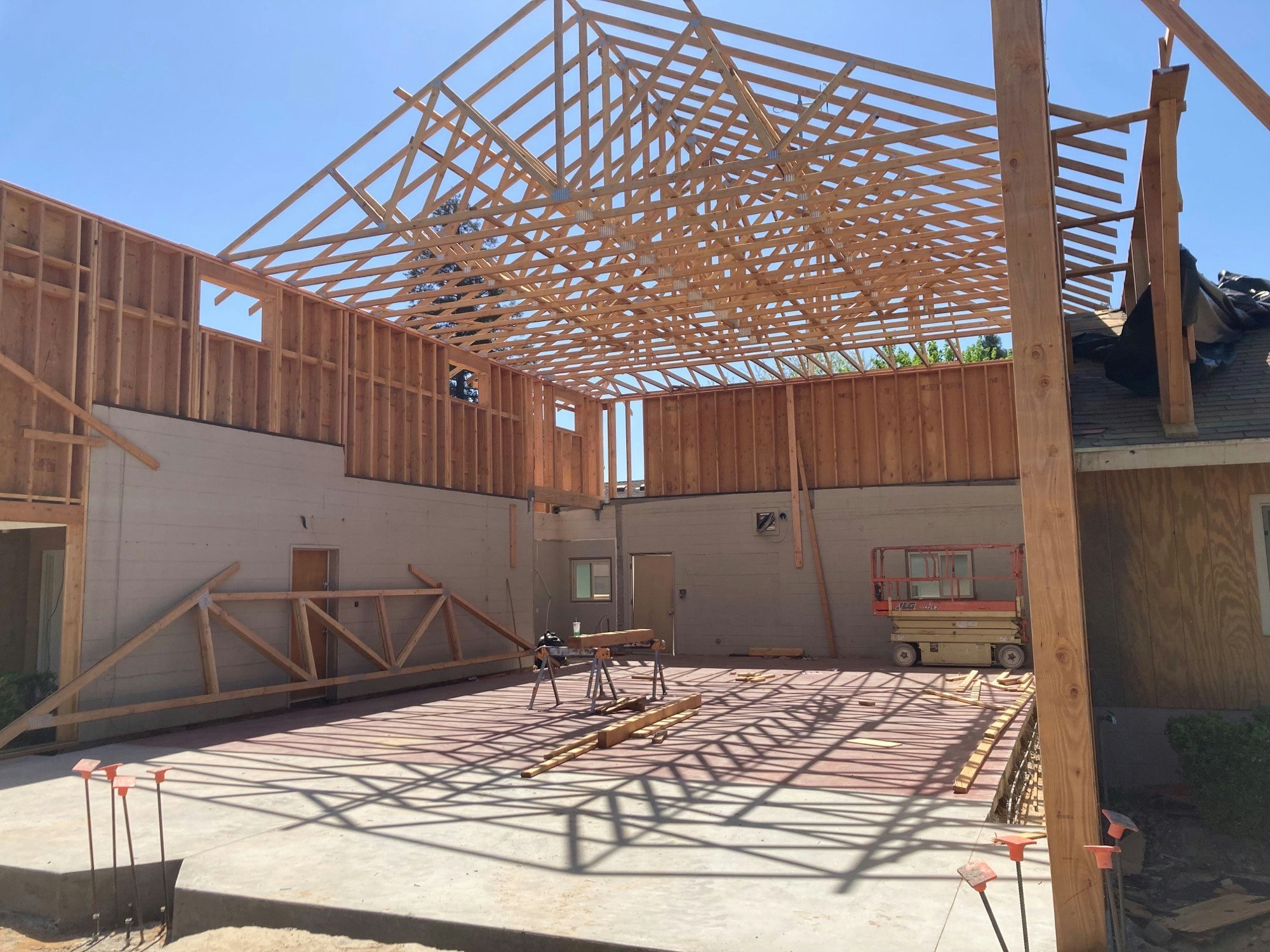 May contain: patio, wood, hangar, building, and floor