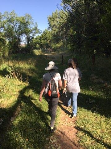 walkers on the Arkansas Riverwalk trail