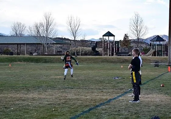 Miner's pavilion in the background of a turkey bowl play