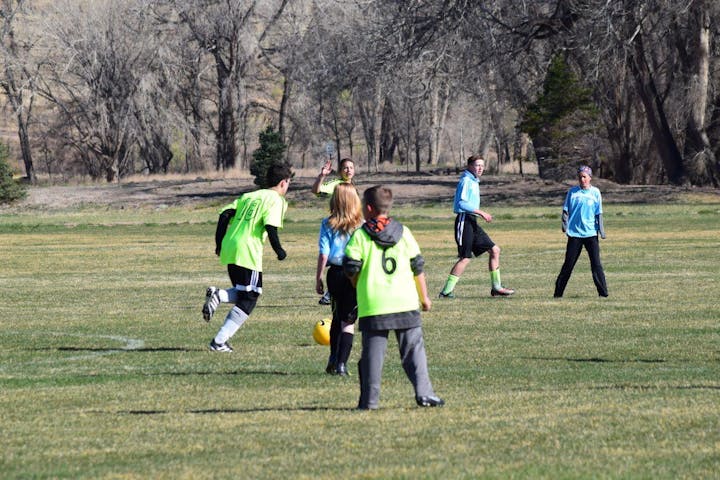 children playing soccer