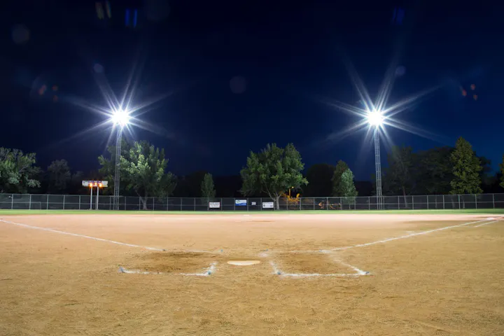 light on at the ball fields in Rouse Park