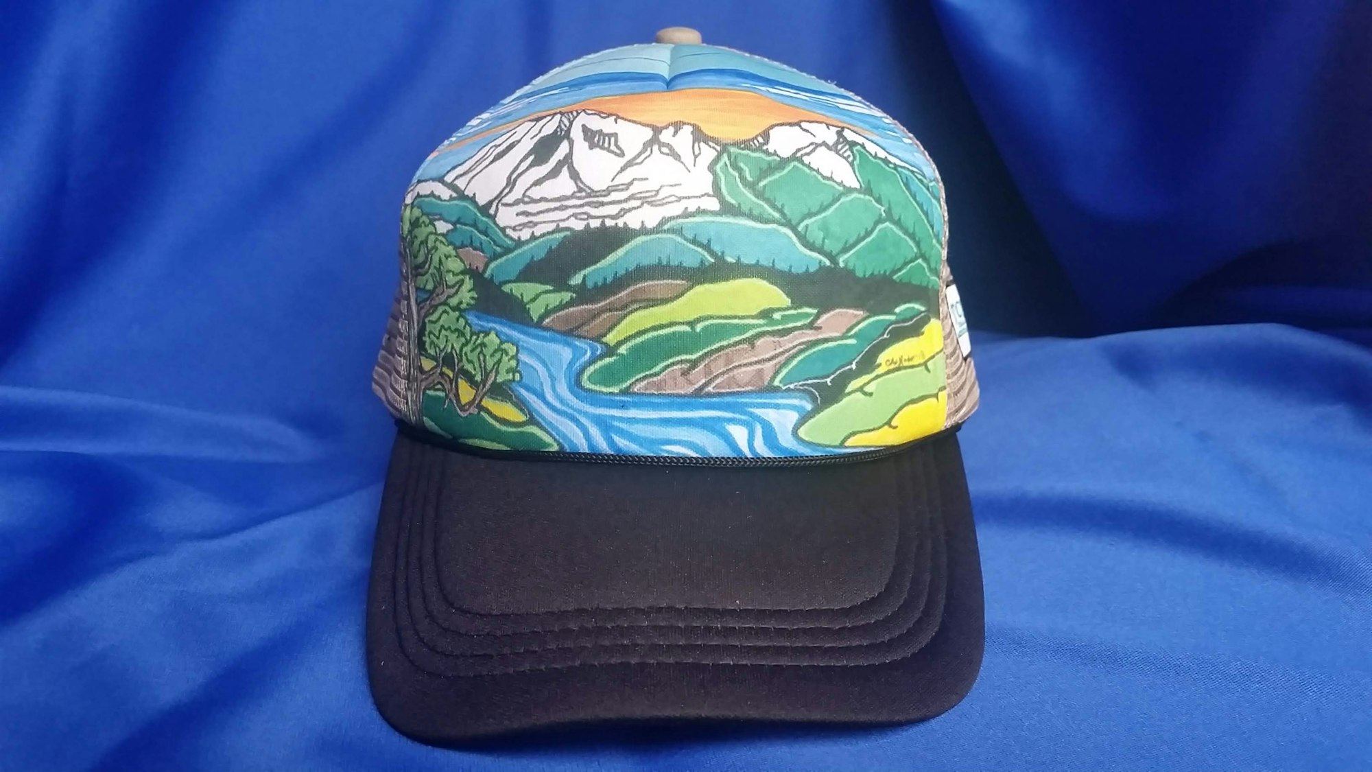 May contain: clothing, apparel, cap, and hat