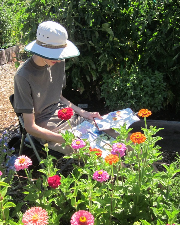 May contain: apparel, clothing, hat, person, human, garden, outdoors, plant, blossom, flower, and geranium