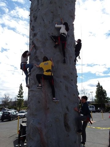 May contain: outdoors, person, human, sport, sports, climbing, and rock climbing