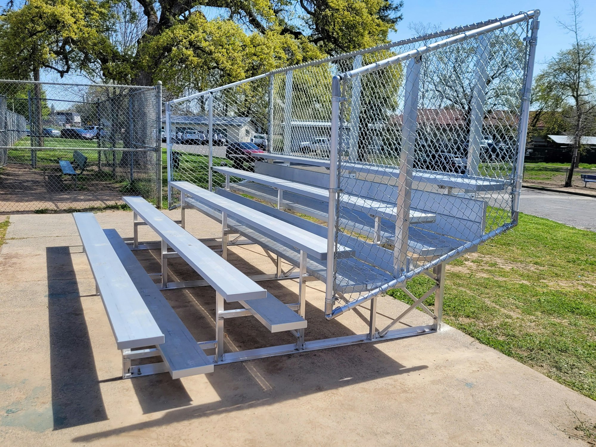 May contain: bench, furniture, dugout, and sport