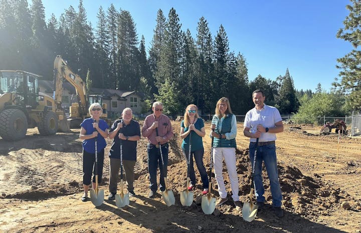 May contain: groupshot, person, outdoors, nature, device, shovel, and tool
