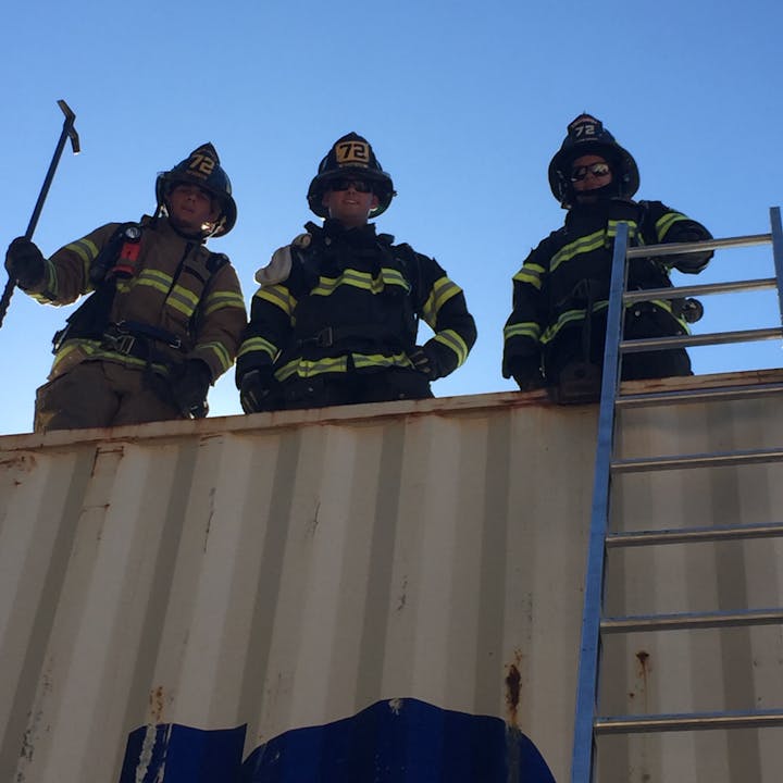 May contain: person, human, fireman, clothing, helmet, and apparel