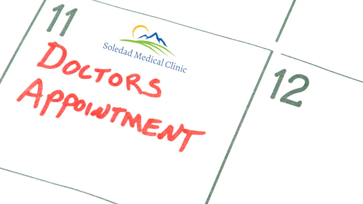 A calendar showing a doctor's appointment on the 11th, with the Soledad Medical Clinic logo at the top.