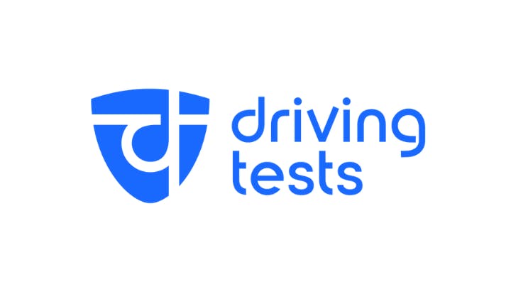 Blue logo with a shield and "driving tests" text.