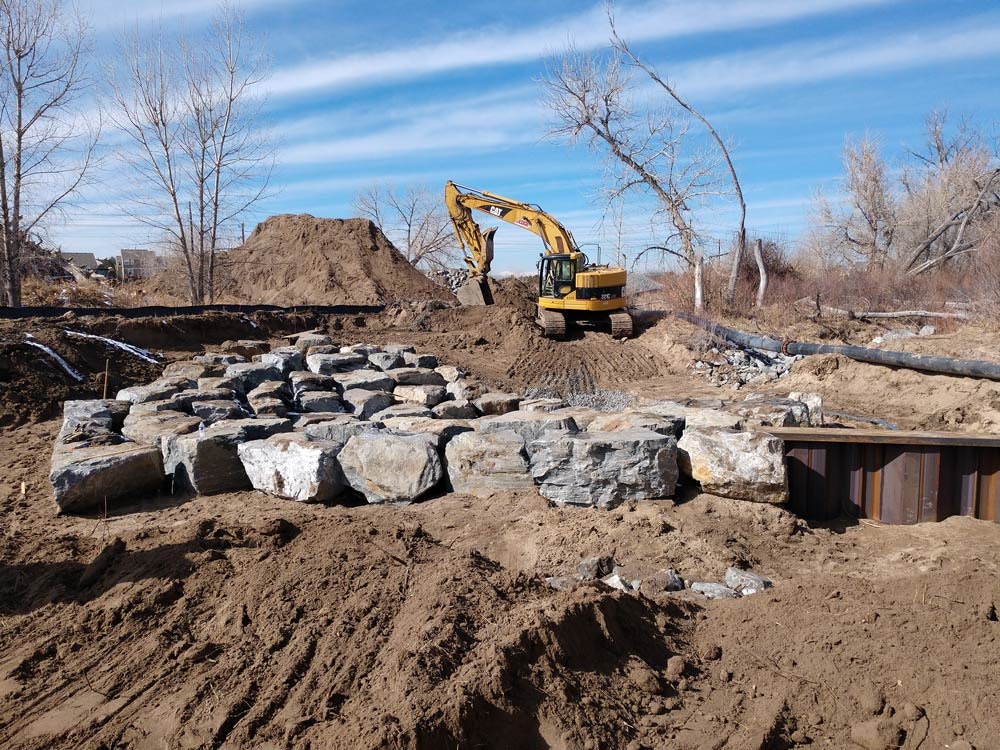 May contain: bulldozer, machine, and construction
