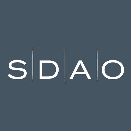 White SDAO logo on dark blue background