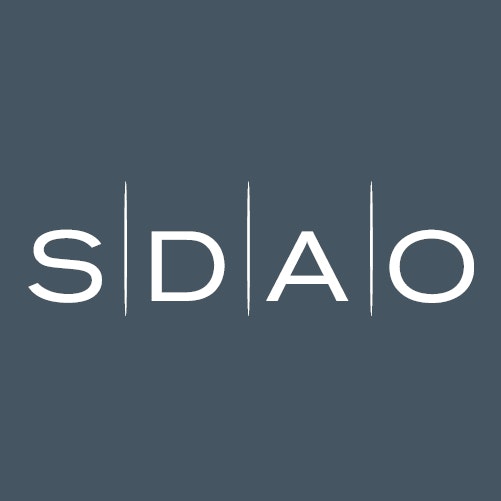 White SDAO logo on dark blue background