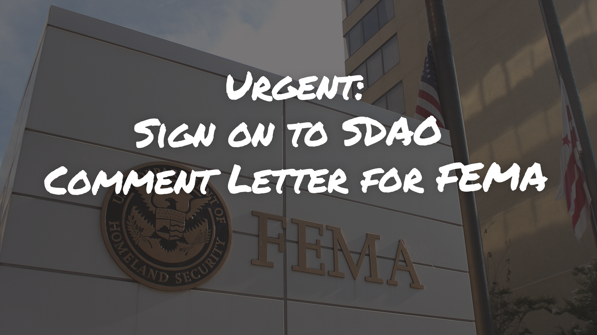 May contain: logo, architecture, building, office building, and city