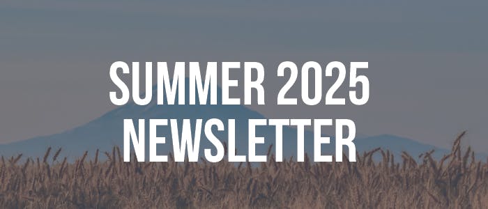 Text "Summer 2025 Newsletter" over a field with a mountain in the background.
