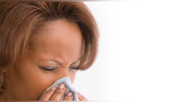 May contain: head, person, face, woman, adult, female, and sneezing