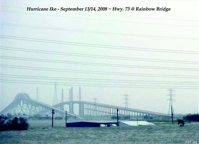 Flooding around Rainbow Bridge after Hurricane Ike, September 2008, with submerged buildings and power lines visible.