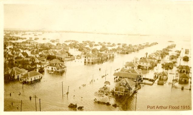 Flooded town with partially submerged houses; caption reads "Port Arthur Flood 1915".