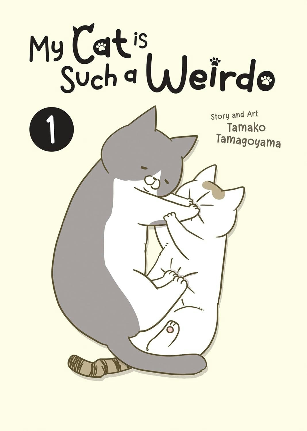 Two cartoon cats cuddling on the cover of "My Cat is Such a Weirdo" by Tamako Tamagoyama, Volume 1.