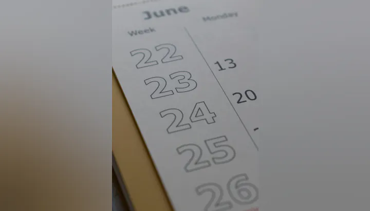 The image shows a close-up of a calendar page for June, highlighting the dates 22 to 26.