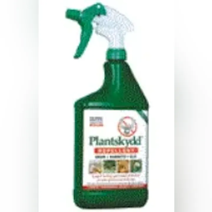 A bottle of Plantskydd repellent with a spray nozzle, labeled for deer resistance.