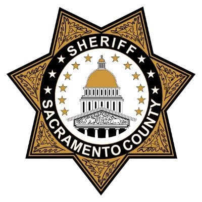 Sacramento County Sheriff's badge with a star and a building design in the center.