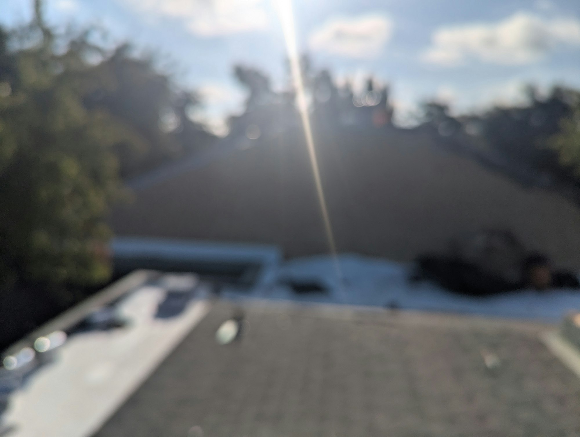 May contain: flare, light, sunlight, and outdoors