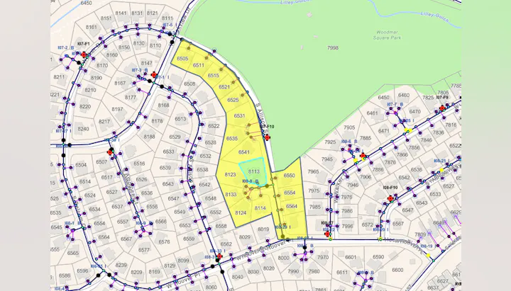 The image shows a map with streets, numbered plots, and highlighted areas near a park, indicating neighborhood layout.