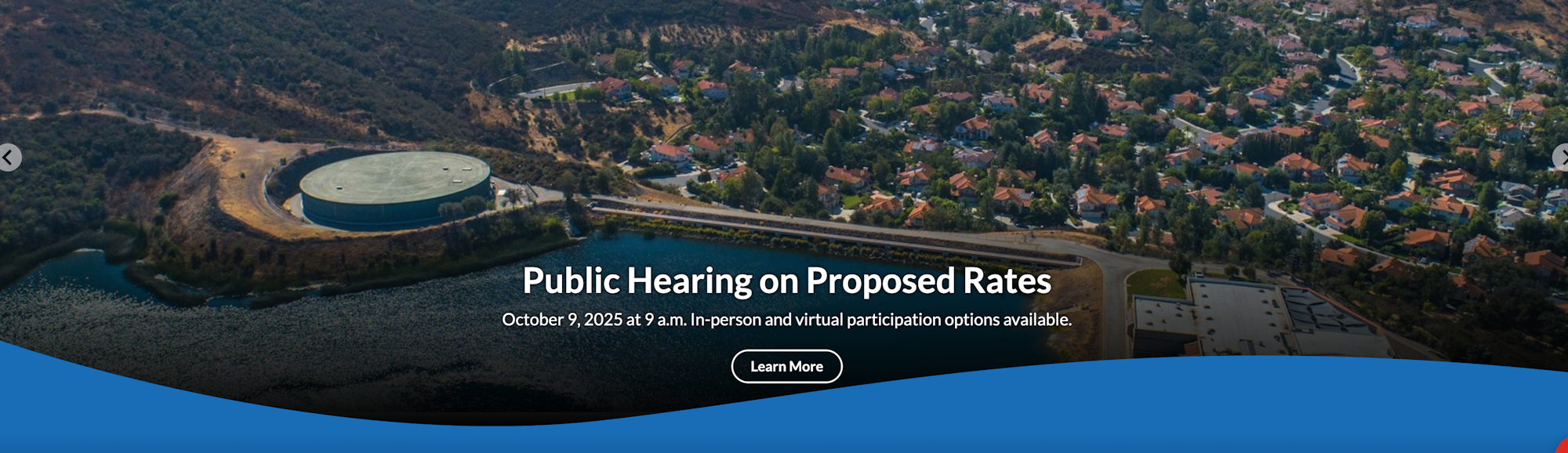 Aerial view of a water facility and suburban homes. "Public Hearing on Proposed Rates" notice for October 9, 2025.
