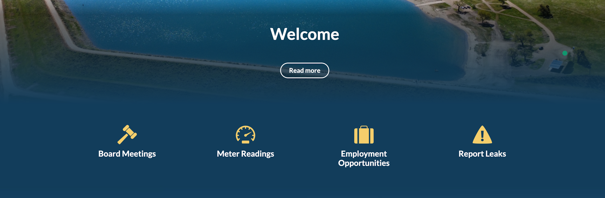 A lakeside aerial view with "Welcome", "Read more", and options for Board Meetings, Meter Readings, Employment Opportunities, and Report Leaks.