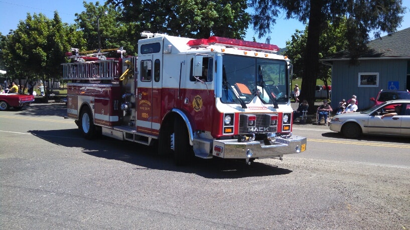 May contain: car, automobile, vehicle, transportation, person, human, truck, fire truck, wheel, and machine