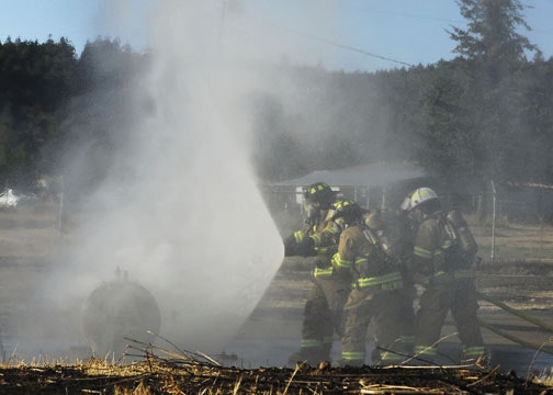 May contain: person, human, helmet, clothing, apparel, and fireman