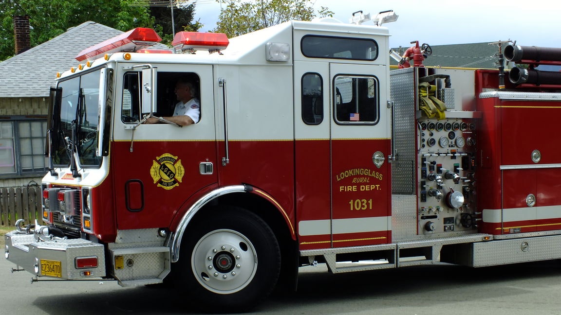 May contain: person, human, truck, vehicle, transportation, and fire truck