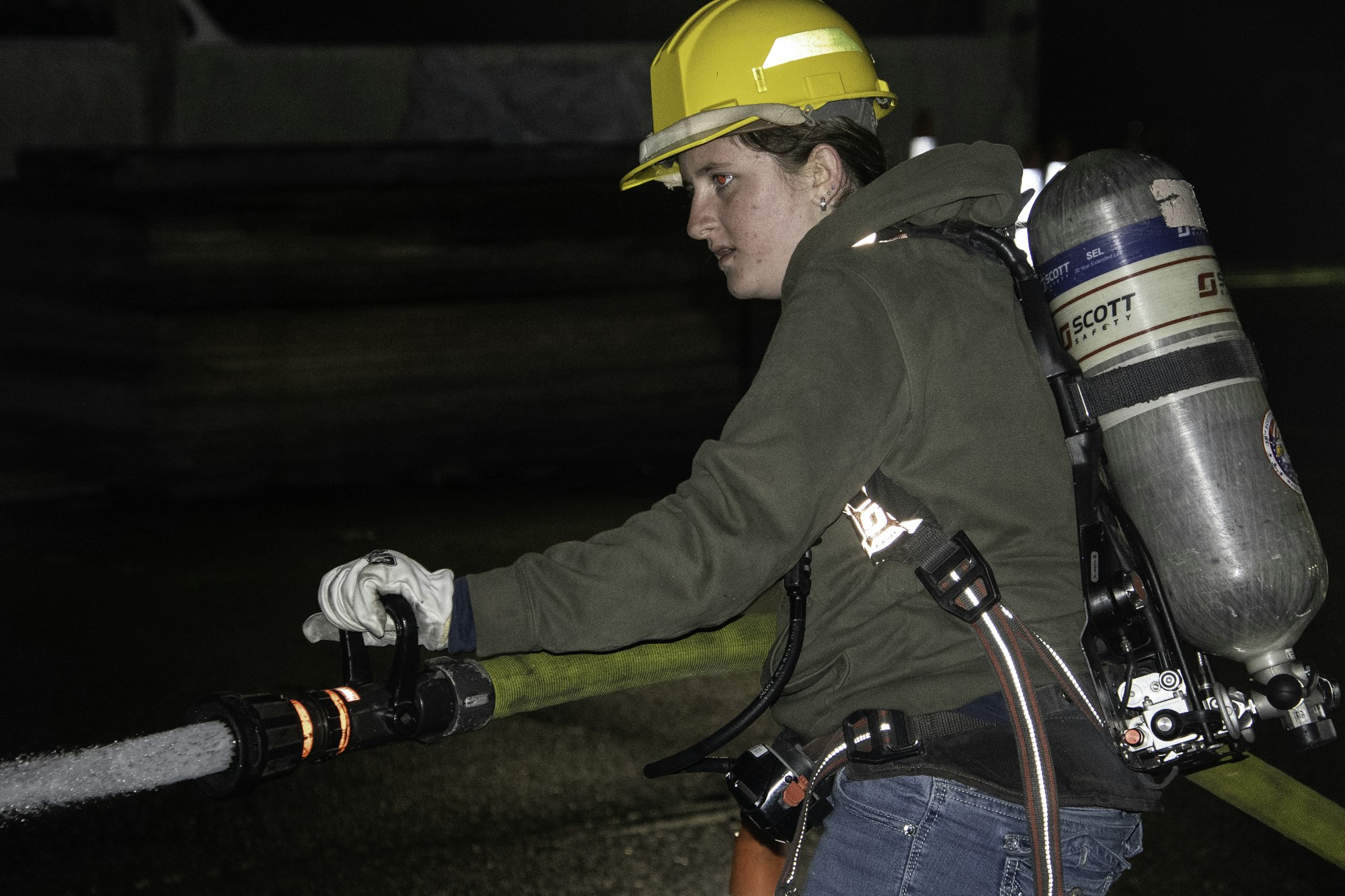 May contain: clothing, hardhat, helmet, glove, adult, male, man, person, and worker