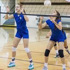 May contain: person, playing volleyball, sport, and volleyball
