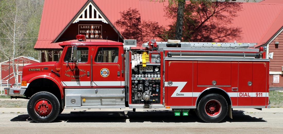 Red fire truck in front of Lake City Volunteer Fire Department.
